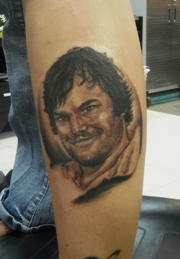 Explore cross tattoo ideas for women, creative tattoo ideas in Sarasota, available at Z-Edge Tattoo and Body Piercing North Shop