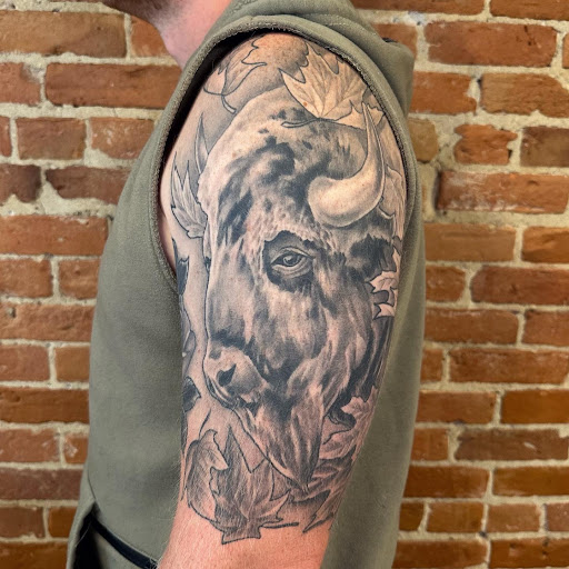 Explore bodybuilding tattoos ideas, creative tattoo ideas in Buffalo, available at The Tilted Rose Tattoo