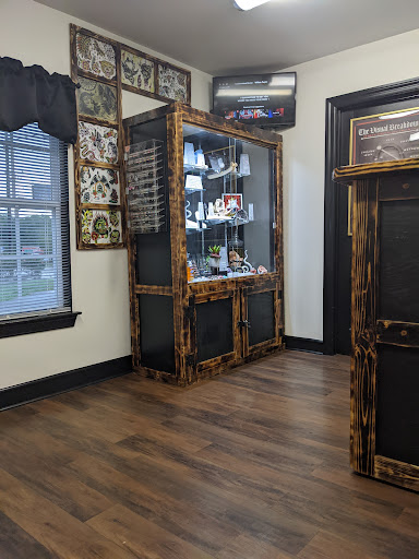 Explore wrist cross tattoo ideas, creative tattoo ideas in Nashville, available at Queen of Hearts Tattoos & Body Piercing