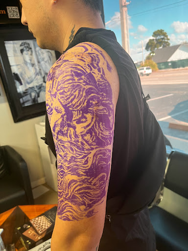 Explore three cross tattoo ideas, creative tattoo ideas in Sarasota, available at SEVEN SINS Tattoo Studio