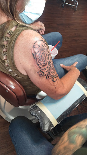 Explore happiness tattoo ideas, creative tattoo ideas in Tucson, available at Machine Age Tattoo