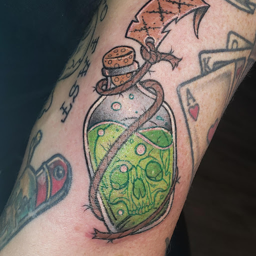 Explore lion cub tattoo ideas, creative tattoo ideas in Cheyenne, available at The T.R.I.B.E. Zoo, LLC Tattoo