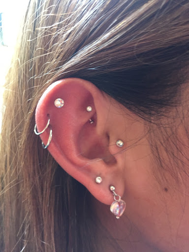 Explore female wonder woman tattoo ideas, creative tattoo ideas in San Diego, available at Body Art Salon