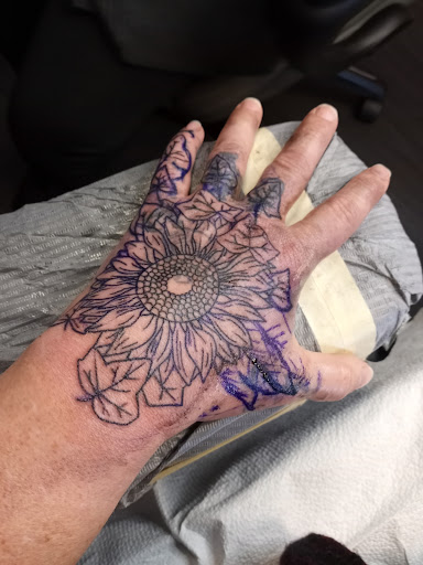 Tattoo Shop «Wizards World», reviews and photos, 801 W High St, Stowe, PA 19464, USA