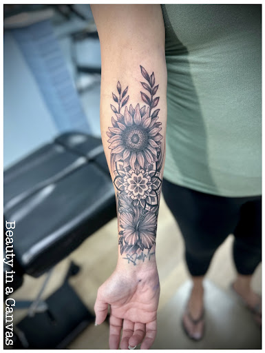 Explore daughter portrait tattoo ideas, creative tattoo ideas in Ocala, available at Beauty in a Canvas Tattoo and Art Gallery