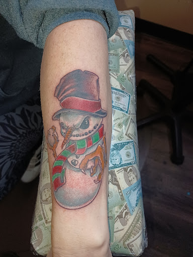 Explore middle arm tattoo ideas, creative tattoo ideas in Harrisburg, available at 717 Tattoo, Body Piercing, and Tattoo Removal Studio 2