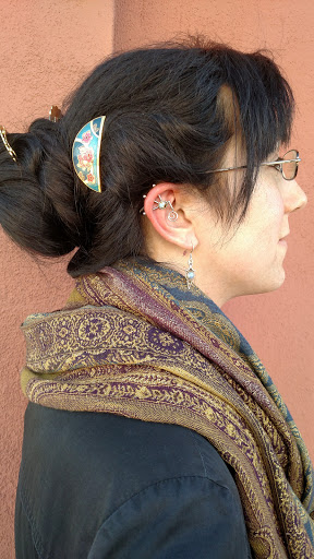 Explore sewing tattoo ideas, creative tattoo ideas in Albuquerque, available at Evolution Body Piercing