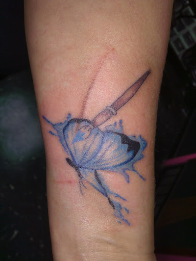 Explore foot tattoos ideas, creative tattoo ideas in Overland Park, available at Inkslingers Tattoo Studio