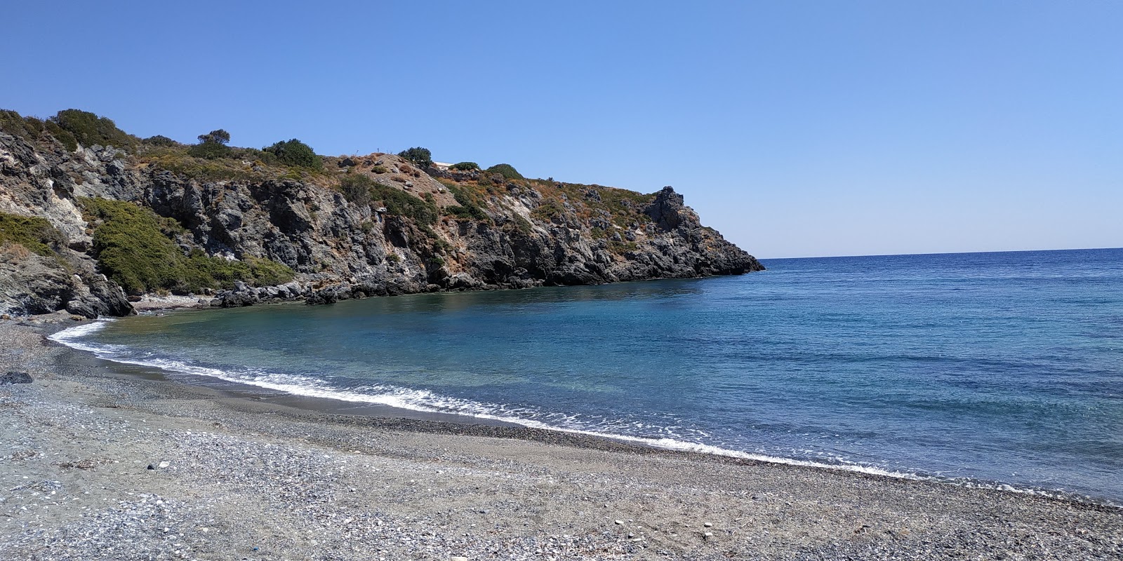 Foto af Agios Georgios beach beliggende i naturområde