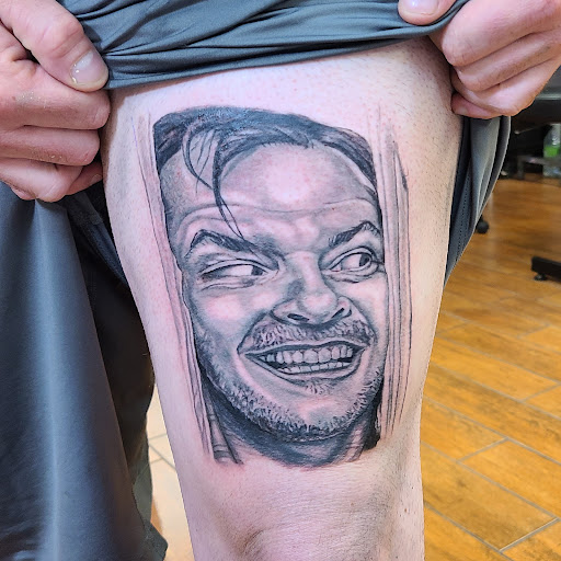 Explore squid tattoo ideas, creative tattoo ideas in Stuart, available at Tiger Shark Tattoo Studio