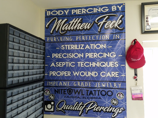 Find small cat tattoo ideas for your next unique tattoo in Tampa at Momentum Tattoo Tampa