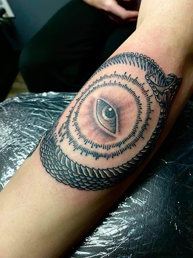 Explore moon and sun tattoo ideas, creative tattoo ideas in Athens, available at United Ink Tattoos and Body Piercings