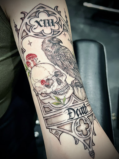 Find in between breast tattoo ideas for your next unique tattoo in Albuquerque at Dark Mark Arts