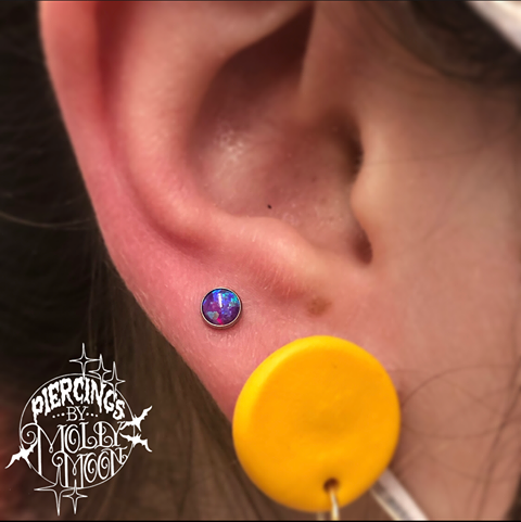 Explore small black and white tattoo ideas, creative tattoo ideas in Oshkosh, available at Piercings by Molly Moon at 920 Tattoo and Piercing