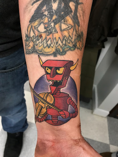 Find spinal cord tattoos ideas for your next unique tattoo in Concord at In The Skin Tattoo NC.