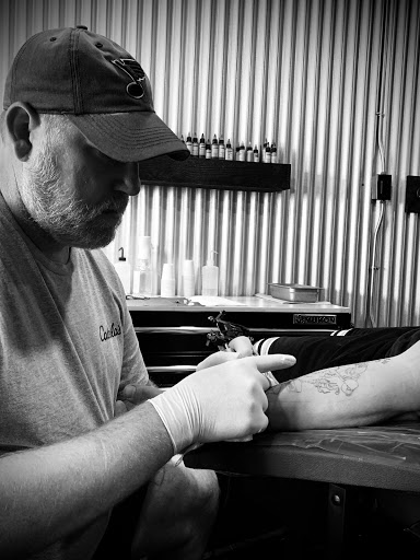 Explore forgiven tattoo ideas, creative tattoo ideas in Denison, available at Crossroads Tattoo Studio