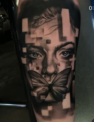 Find tattoo ideas of roses for your next unique tattoo in Clinton at Black Relic Tattoo