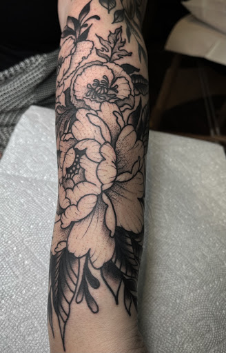 Explore tattoo ideas for him and her, creative tattoo ideas in Johnson City, available at Gold Cross Tattoo Co.