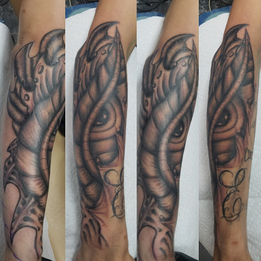 Find cool armband tattoo ideas for your next unique tattoo in Bowling Green at 31 Ink Tattoo Parlor