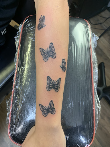 Explore tattoo ideas on ribs for men, creative tattoo ideas in Whiteville, available at Coup de Gras 2.0 Tattoo and Body Piercing