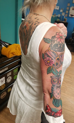 Tattoo Shop «The Iron Inkwell Custom Tattoos & Piercings», reviews and photos, 1901 N Monroe St Suite D, Tallahassee, FL 32303, USA