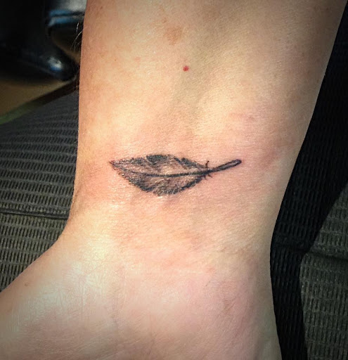 Explore pin up girl tattoo ideas, creative tattoo ideas in Asheboro, available at Blue Luna Tattoo Company, LLC