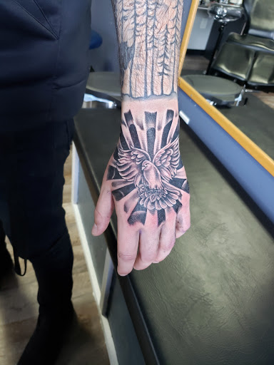 Tattoo Shop «Next Level Tattoo Company - Imlay City», reviews and photos, 420 E 3rd St, Imlay City, MI 48444, USA