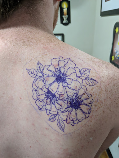 Explore tattoo ideas for women leg, creative tattoo ideas in Bismarck, available at Alchemist Tattoo & Body Piercing