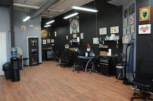 Explore leg tattoo ideas black male, creative tattoo ideas in Lansing, available at True Contrast Tattoo