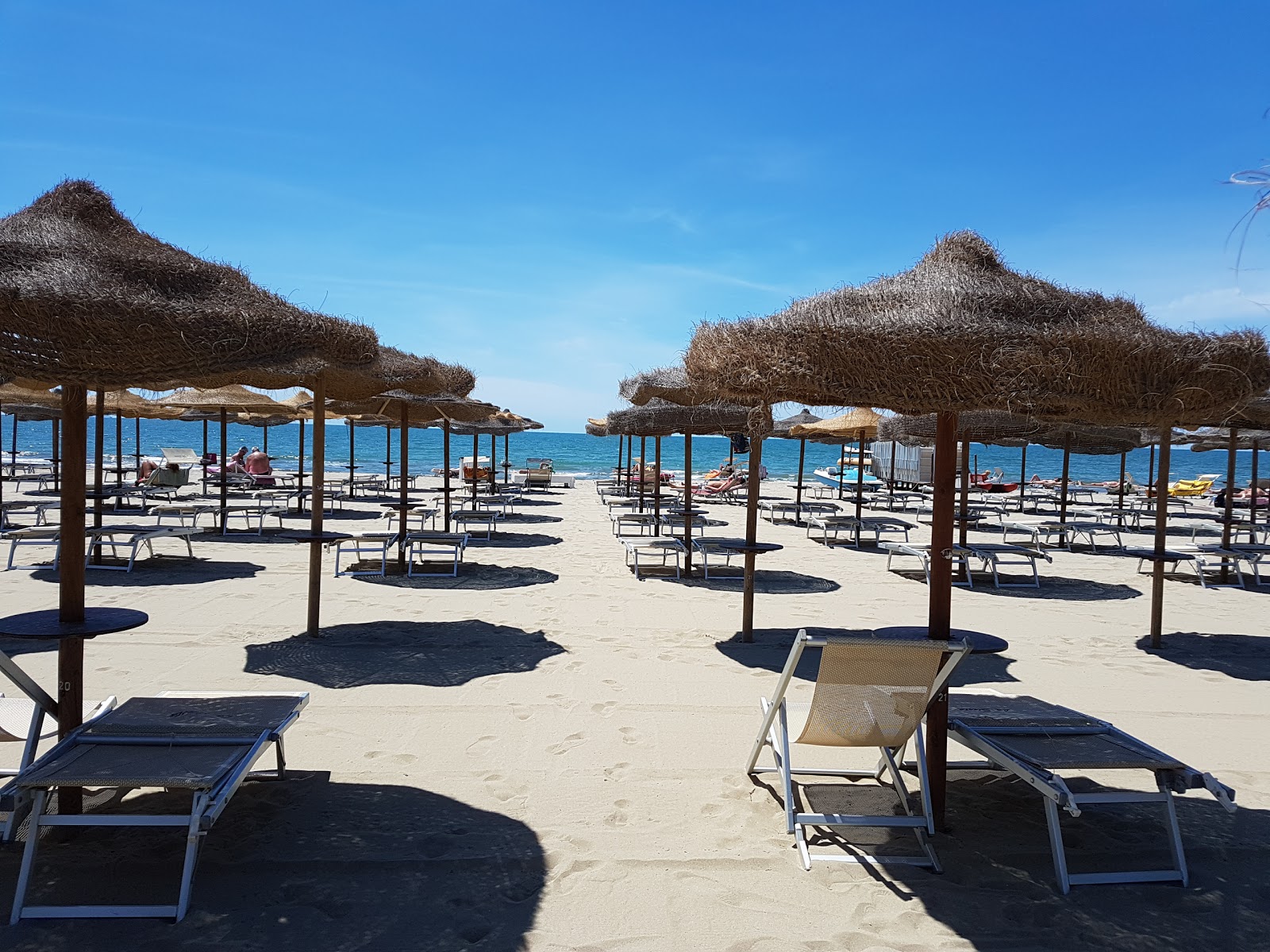 Foto de Spiaggia Libera Tirrenia - lugar popular entre os apreciadores de relaxamento
