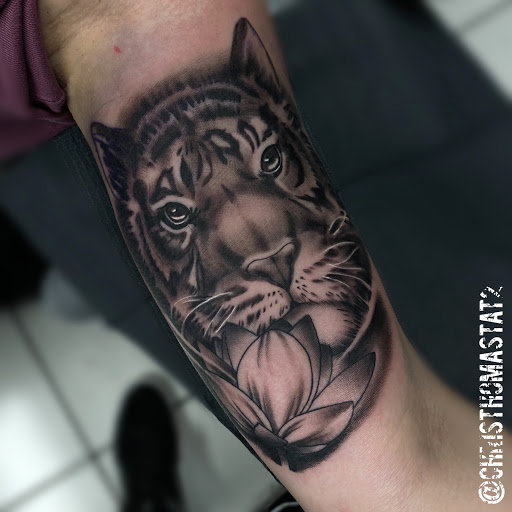 Explore red ink neck tattoo ideas, creative tattoo ideas in Sherwood, available at Golden Lotus Tattoo Studio