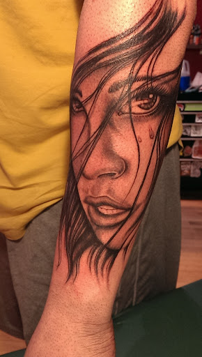 Explore christian sleeve tattoo ideas, creative tattoo ideas in Chicago, available at Revolution Tattoo