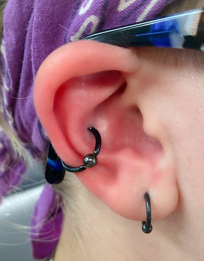 Explore cover up tattoo ideas on chest, creative tattoo ideas in Springfield, available at Body Piercing By Qui Qui