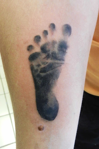 Tattoo Shop «One Love Tattoos», reviews and photos, 903 N Austin Ave, Georgetown, TX 78626, USA