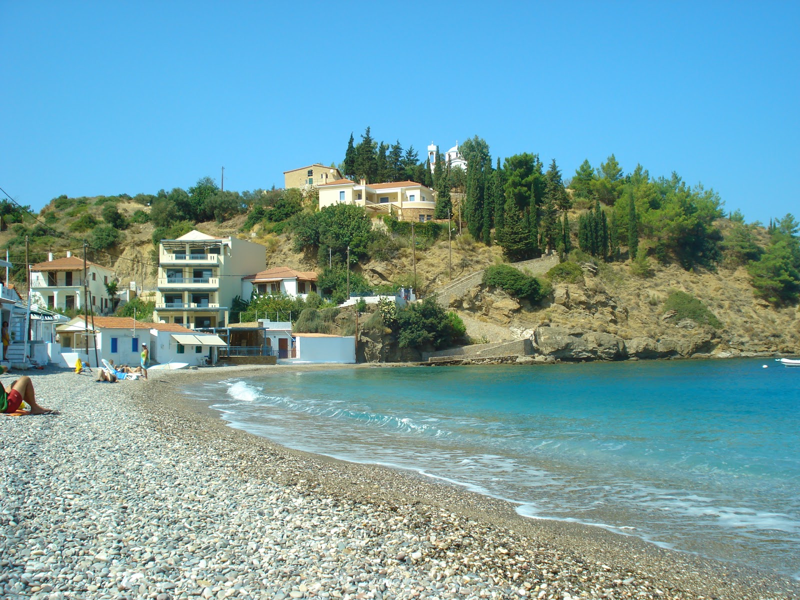 Fotografie cu Nagos Beach cu o suprafață de apa pură turcoaz