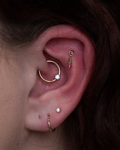 Explore female calf tattoo ideas, creative tattoo ideas in Boston, available at Arcadia Body Piercing