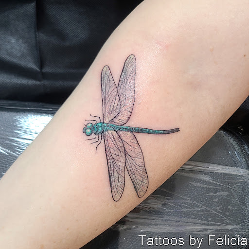 Explore flower shoulder tattoo ideas, creative tattoo ideas in Fort Myers, available at Tiger Lotus Tattoo and Piercing