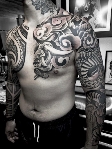 Explore german tattoo ideas for guys, creative tattoo ideas in Denver, available at Mantra Tattoo and Piercing