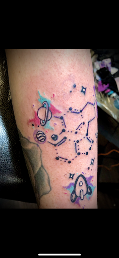 Explore women's back tattoo ideas, creative tattoo ideas in Warrensburg, available at Altered Visions Tattoo Studio