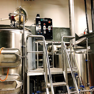 Brewing tanks in a taproom