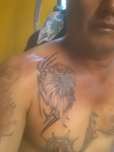 Tattoo Shop «Chicky Tattwo Tattoo Parlor», reviews and photos, 2001 W Main St, Leesburg, FL 34748, USA