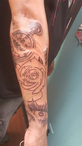 Explore grandchild tattoo ideas, creative tattoo ideas in Lafayette, available at Crown & Anchor Tattoos