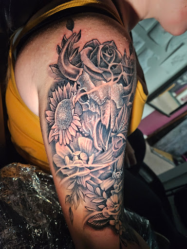 Explore lost love tattoo ideas, creative tattoo ideas in Angola, available at Hoodlum Ink