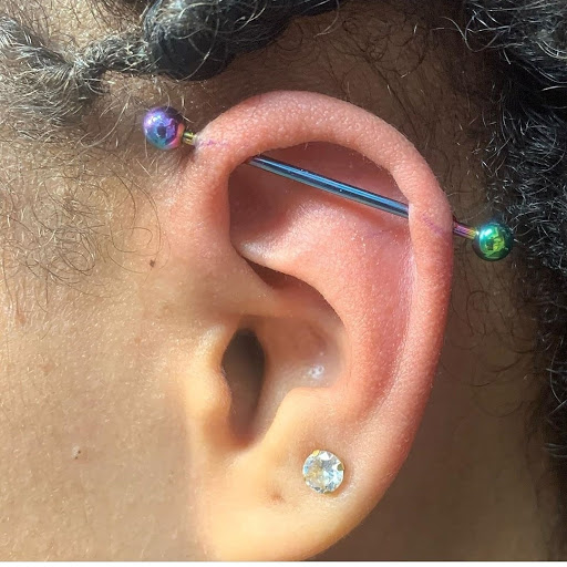 Explore wrap tattoo ideas, creative tattoo ideas in Charleston, available at Exotic Impressions Body Piercing