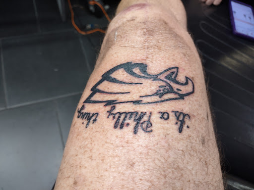 Explore black power tattoo ideas, creative tattoo ideas in Leesburg, available at House of Ink