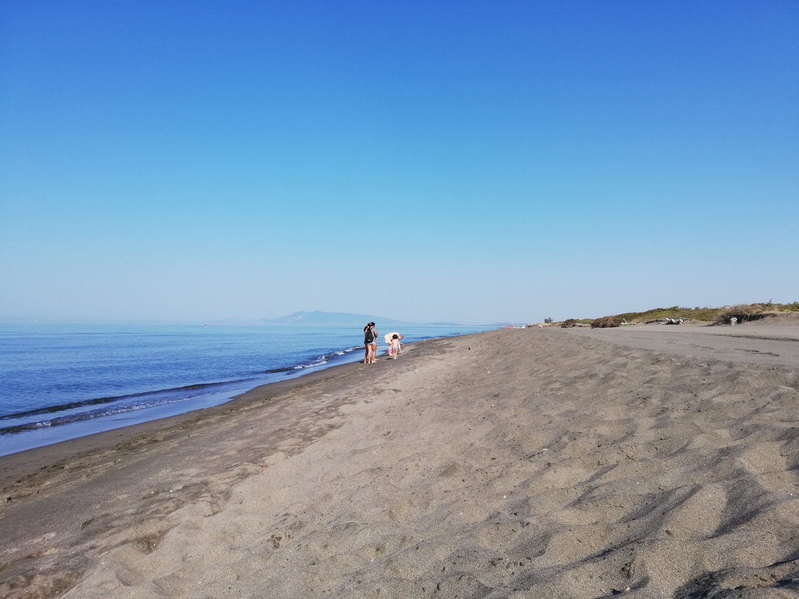 Valokuva Spiaggia di Pescia Romanaista. puhtaustasolla korkea