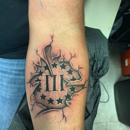 Explore cover up tattoo ideas male arm, creative tattoo ideas in Hudson Falls, available at ALTERED ADDICTION TATTOOS