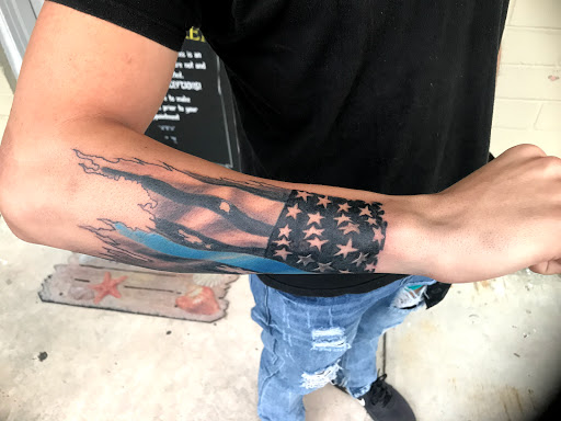 Explore daisy tattoo ideas, creative tattoo ideas in Ocala, available at The Tattoo Gallery of Ocala LLC