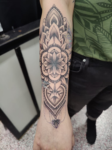 Explore shinedown tattoo ideas, creative tattoo ideas in Rogers, available at Jimmy Romance Tattoo & Body Piercing