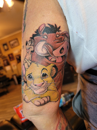 Explore violin tattoo ideas, creative tattoo ideas in Scarborough, available at Leviathan Tattoo